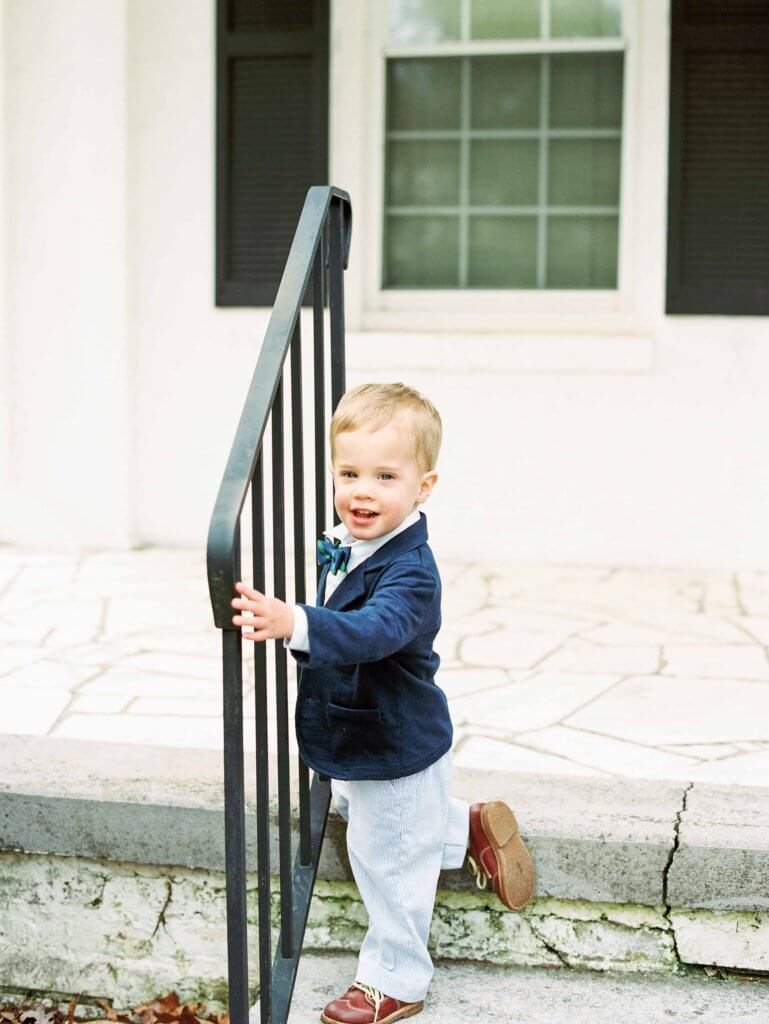 Boy on front porch 