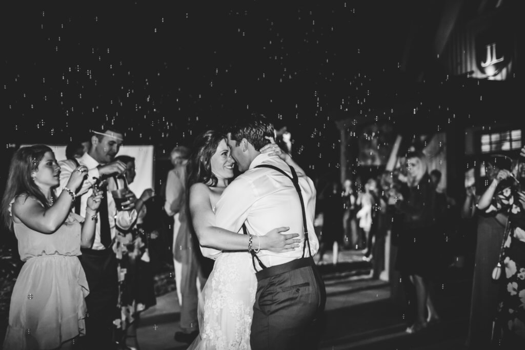 Bride and groom exit at Jolo Winery