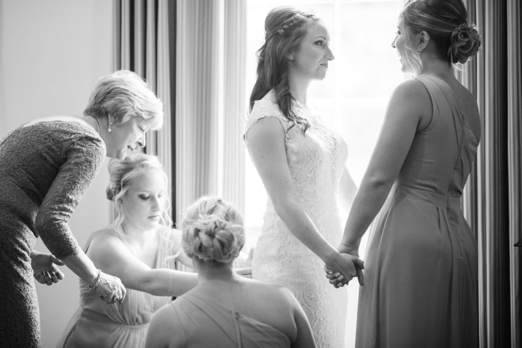 Bride getting dressed at Starmount Presbyterian Church Greensboro NC