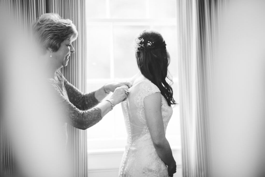 Bride getting dressed at Starmount Presbyterian Church Greensboro NC